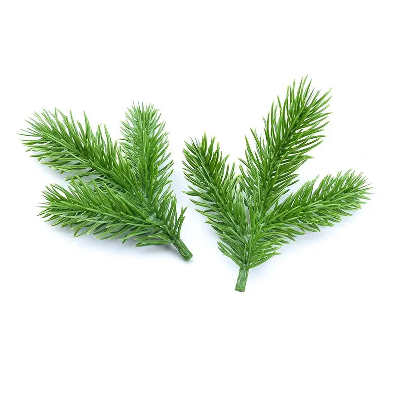 Two artificial green pine needle plants with detailed foliage by DecorBites™ for Christmas decor and wreaths