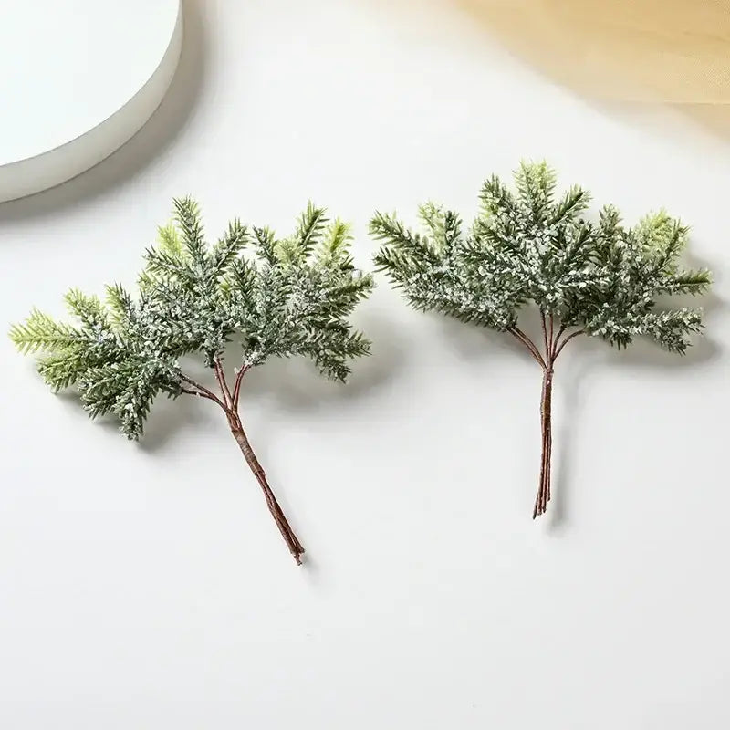 DecorBites™ artificial pine needles with frosted tips made from synthetic material for winter home decor and garlands