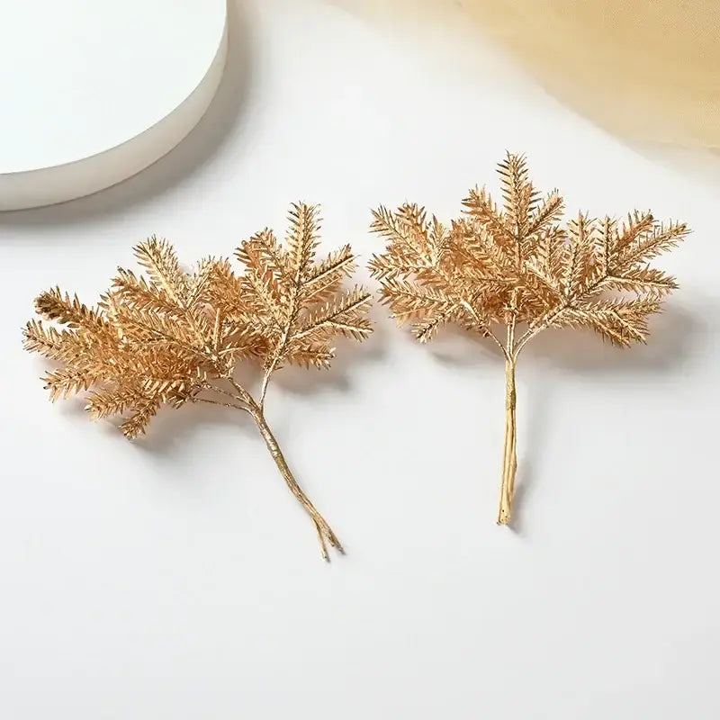 Golden metallic artificial pine needles decor pieces from decorbites for home decor and christmas garlands