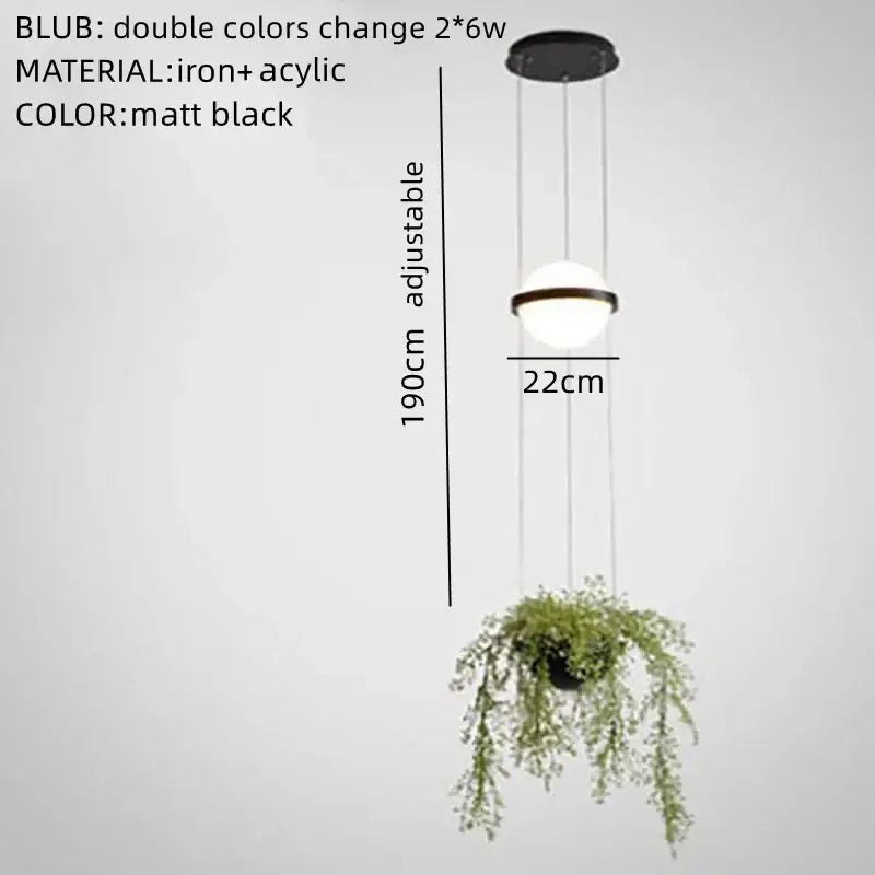 Matte black DecorBites™ artificial plant pendant light with adjustable spherical acrylic bulb and hanging pot