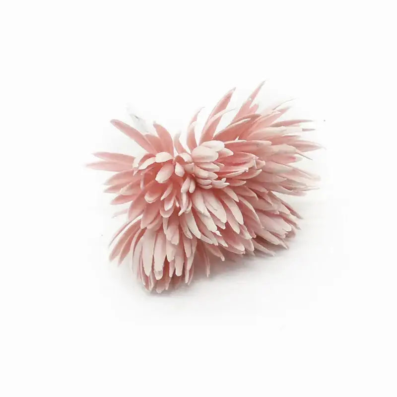 A delicate pink decorbites artificial plant fake flower with layered feathery petals for christmas decor and home interior