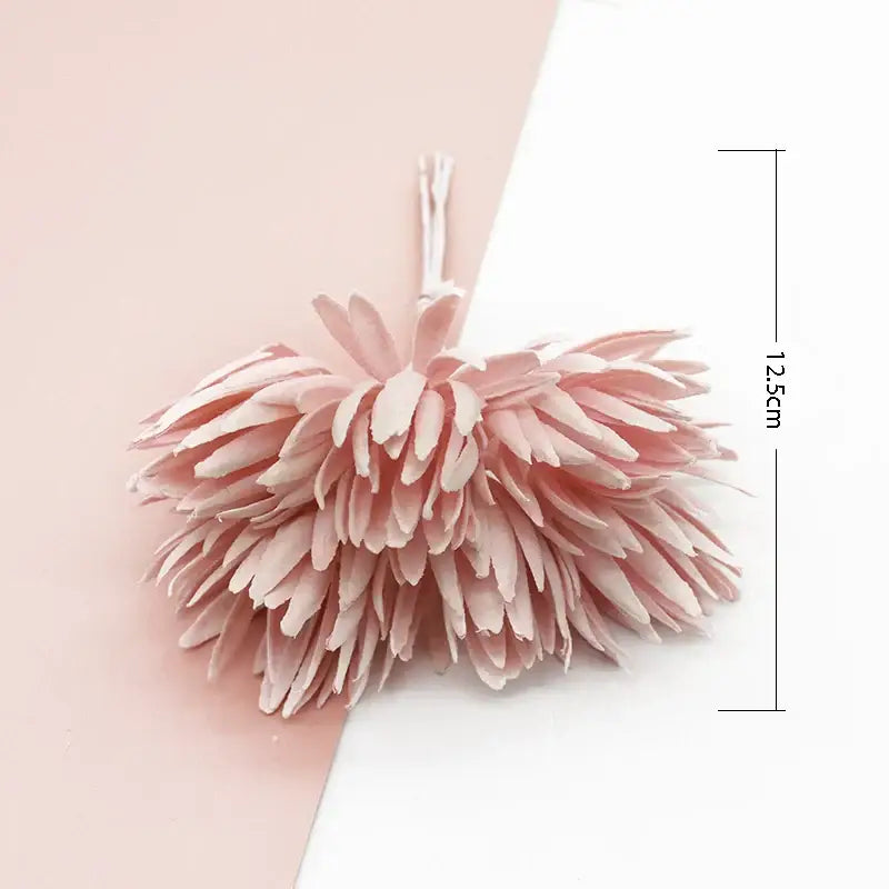 A delicate pink decorbites artificial plant fake flower with layered feathery petals and white stem for christmas decor