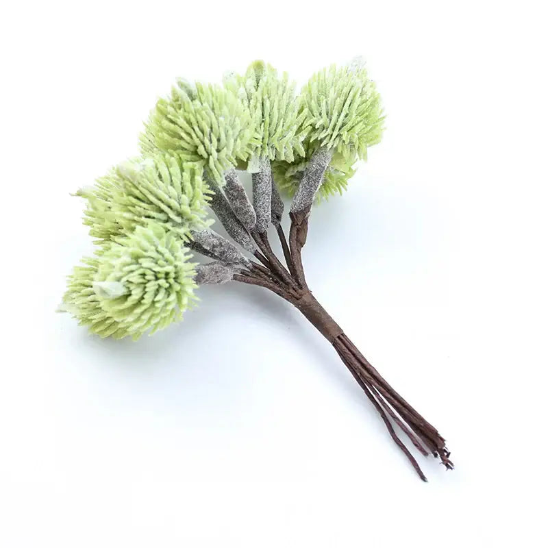 A bundle of decorbites artificial plants with frosted green willow branches and fluffy textured tips for christmas decor