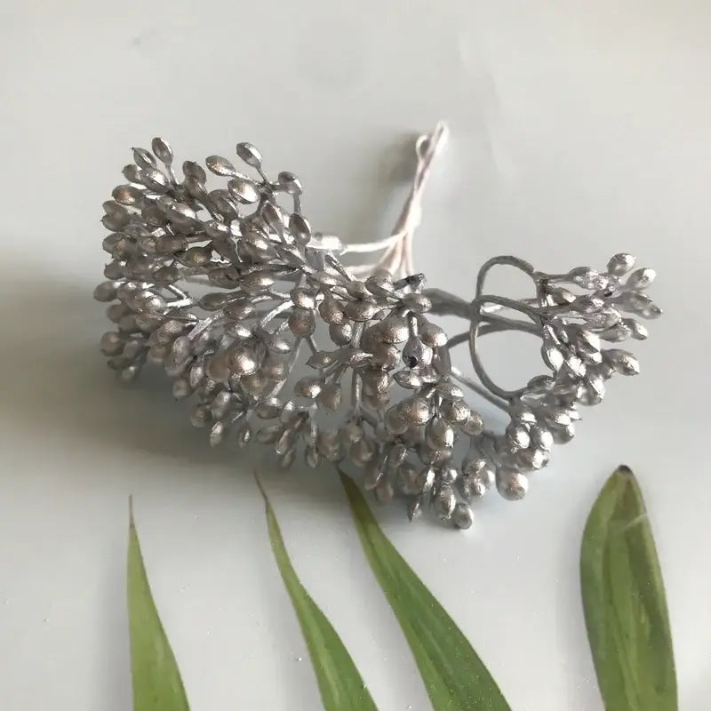 Silver metallic hair accessory shaped like a delicate branch with clustered berries and leaves from decorbites artificial plants dried plants collection for diy decor