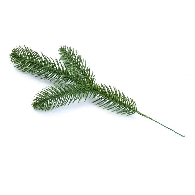 Green artificial pine branch with detailed needle-like foliage and slender stem from decorbites artificial plants bridal decor