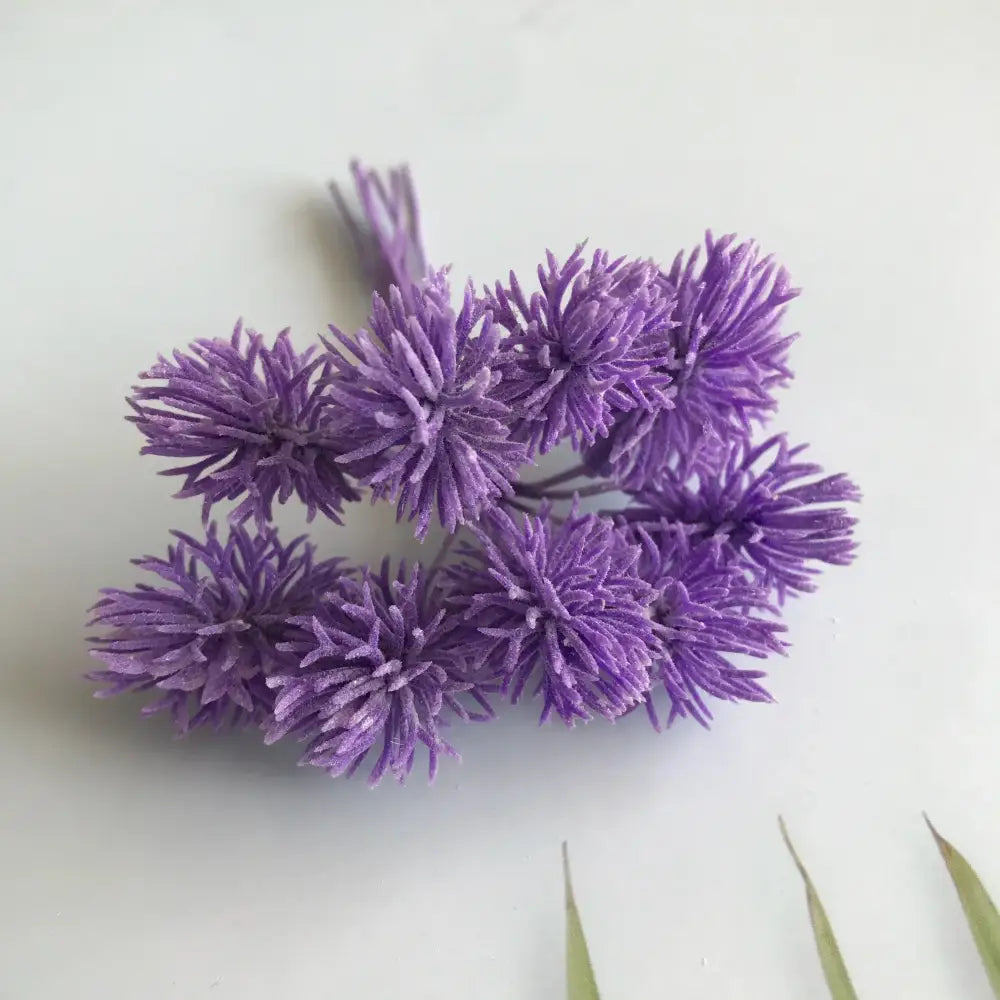 A cluster of purple spiky petals with thin stems in decorbites artificial plants set of 6 simulation fake plants