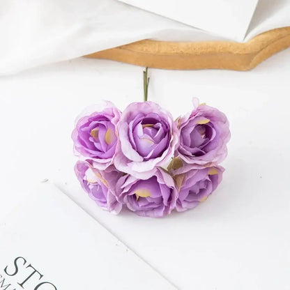 A decorbites artificial rose bouquet featuring delicate lavender petals with yellow centers for home and wedding decor