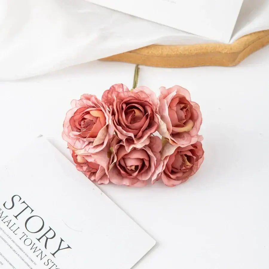 A decorbites artificial rose bouquet featuring five soft pink layered petals ideal for christmas wedding decor