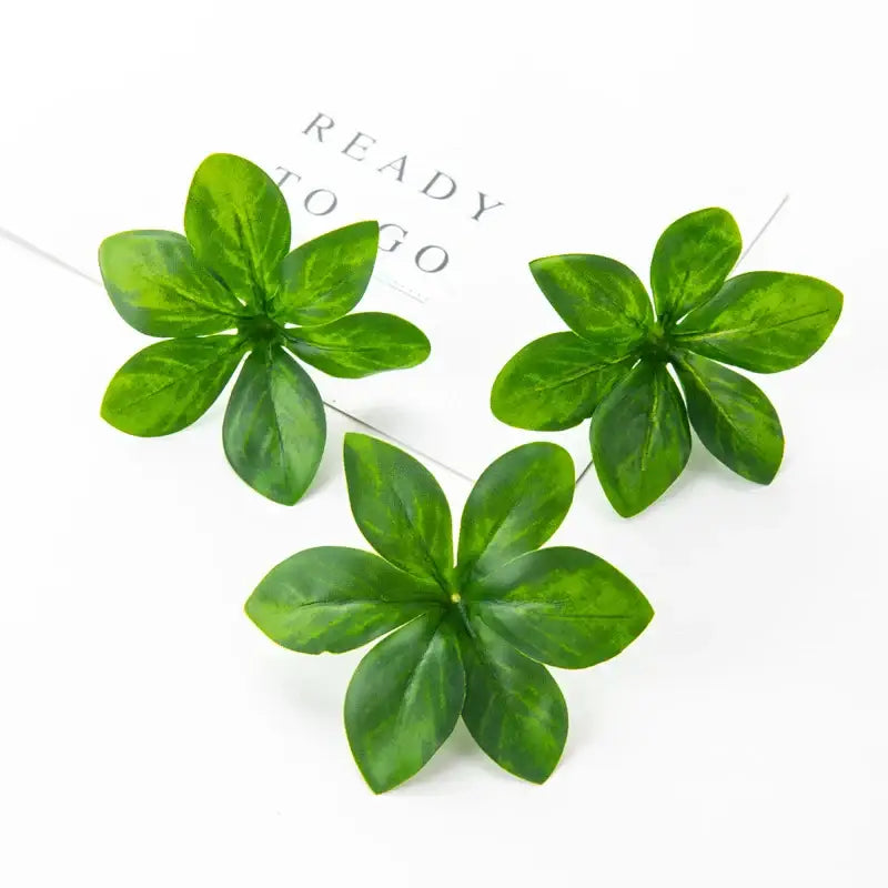 Three glossy green artificial rose leaf stems with veined texture by decorbites for diy wreaths and home decor