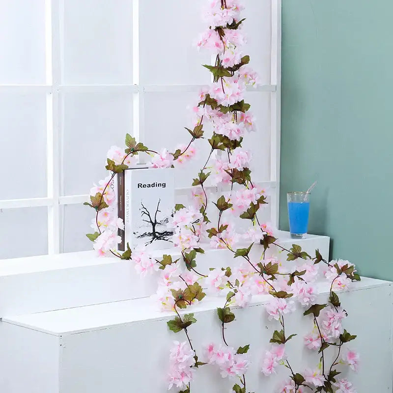 Delicate pink decorbites artificial sakura flowers vine with green leaves for wedding garden rose arch decoration