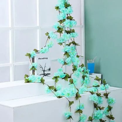 Decorbites artificial sakura delicate turquoise sakura flowers vine with green leaves for wedding garden rose arch decoration