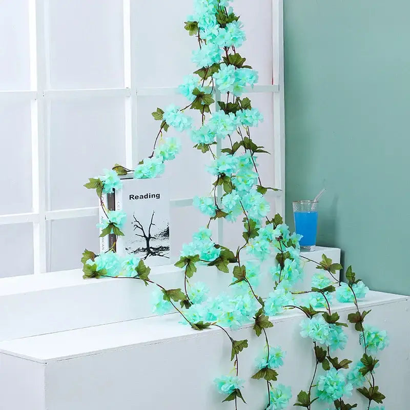 Decorbites artificial sakura delicate turquoise sakura flowers vine with green leaves for wedding garden rose arch decoration