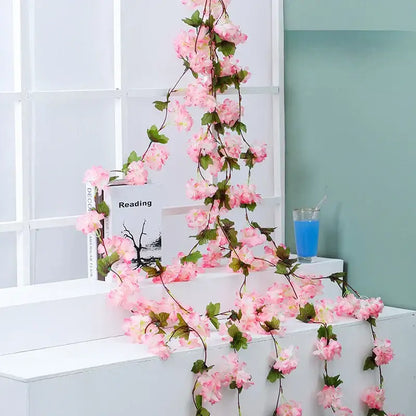 Decorbites artificial sakura delicate pink sakura flowers vine with green leaves for wedding garden rose arch decoration