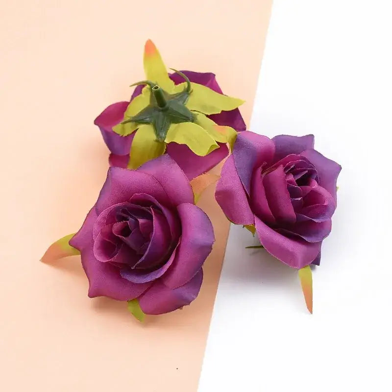 Decorbites artificial silk roses head set featuring vibrant purple artificial silk roses with yellow-tipped petals and green stems for wedding and home decor