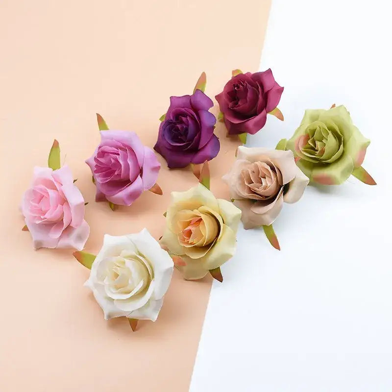 A collection of decorbites artificial silk roses in soft pastel tones made from fabric for wedding home decor and diy wreaths