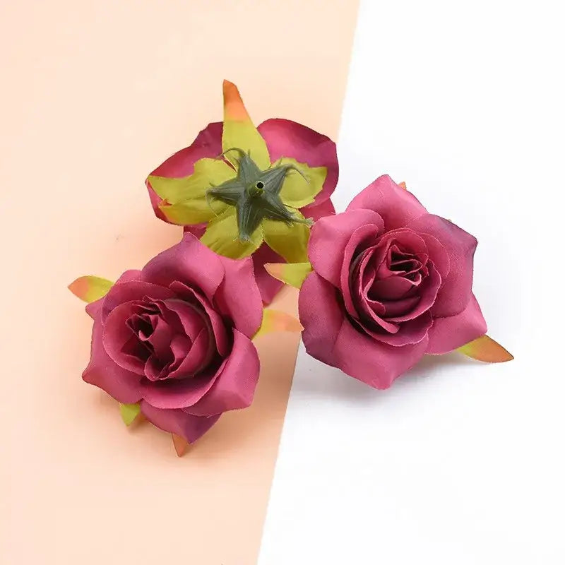 Three magenta decorbites artificial silk roses with green stems and yellow-tipped petals for wedding home decor