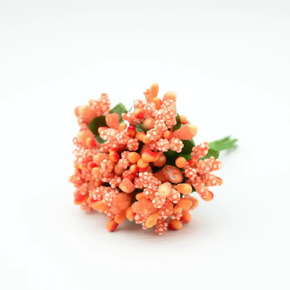 A vibrant coral-orange decorbites artificial stamen flower bouquet with bead-like petals and green ribbon stems for decor