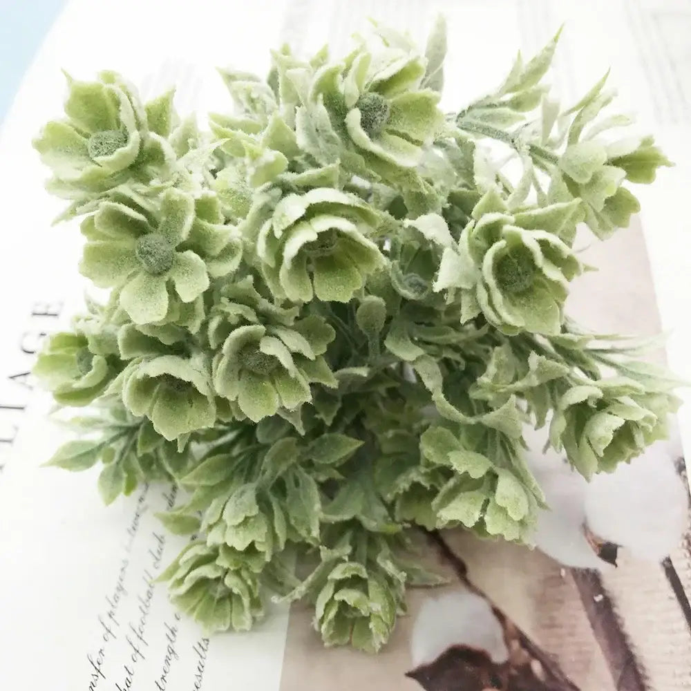 A cluster of green artificial succulent flowers with frosty textured petals in the decorbites artificial succulent tree