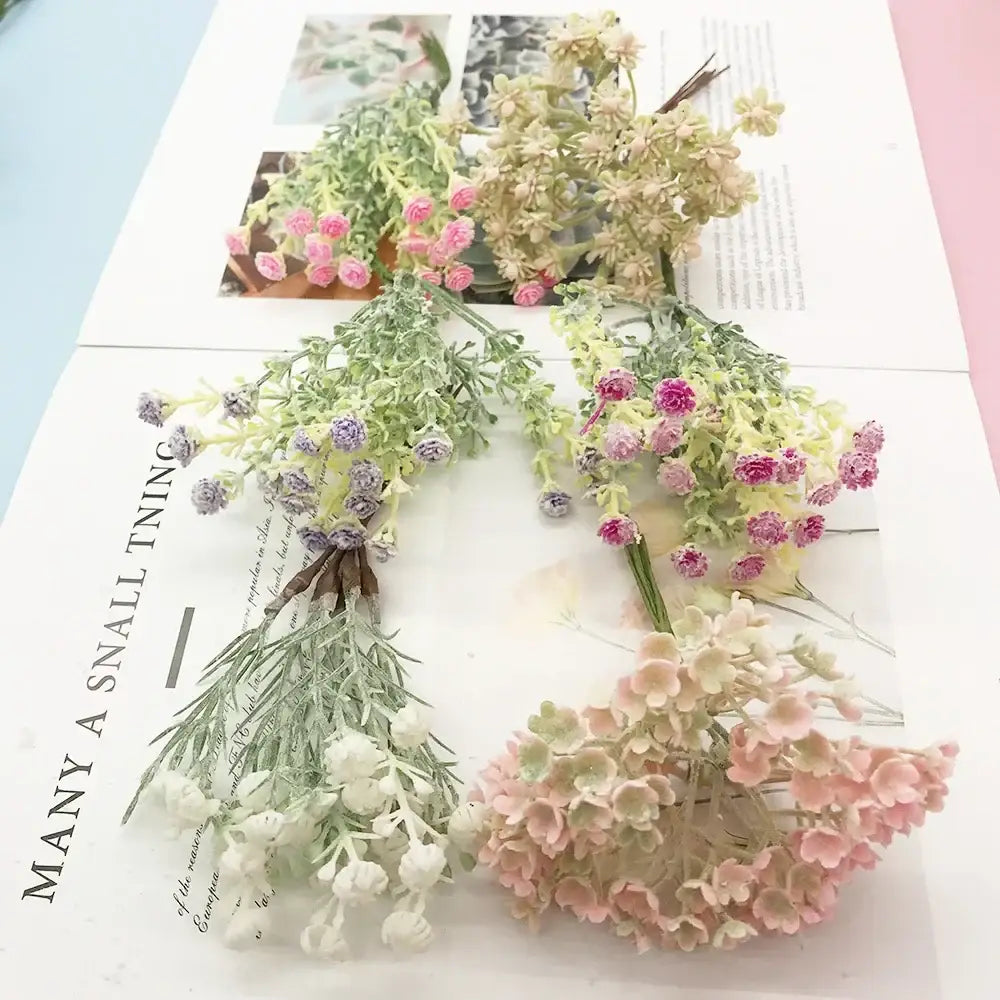 A decorbites™ artificial succulent tree featuring delicate pastel pink lavender and cream flowers with green foliage for home décor