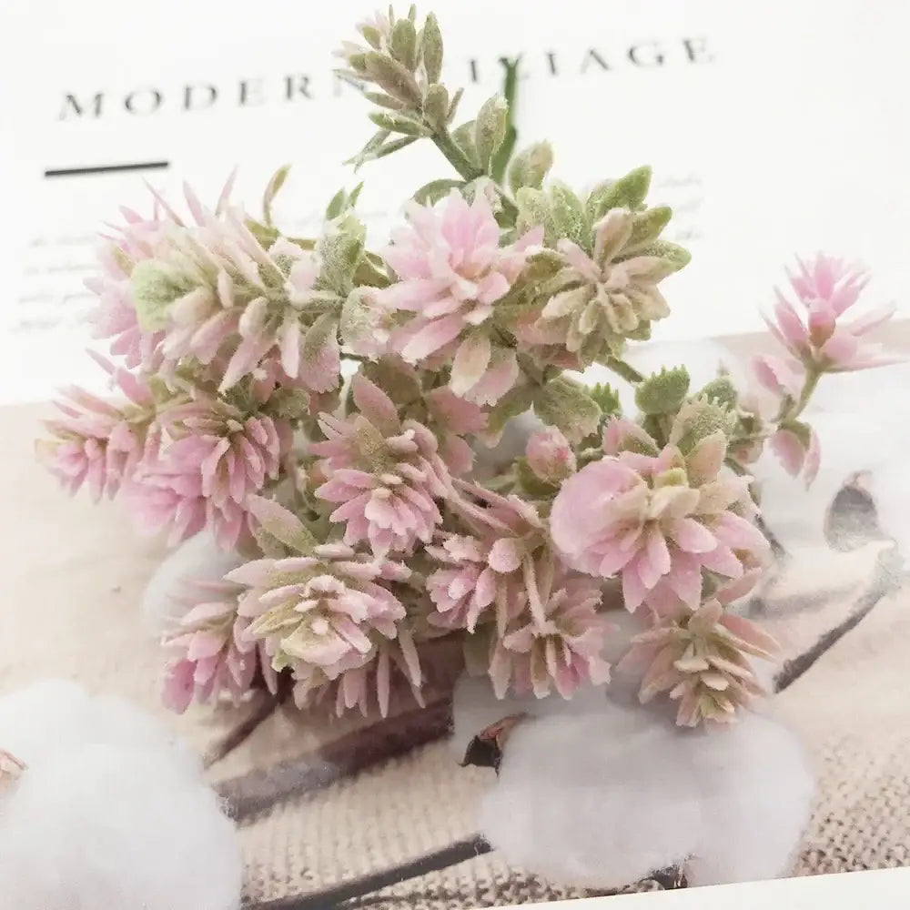 A delicate cluster of pink and green frosted artificial succulent tree flowers from decorbites for home décor and events