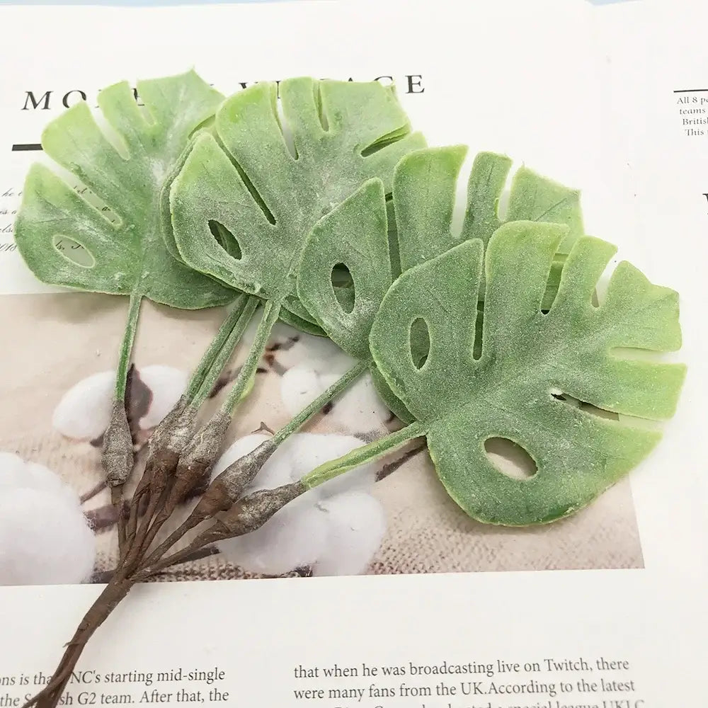 DecorBites™ artificial succulent tree featuring matte light green textured monstera leaves for home décor and events