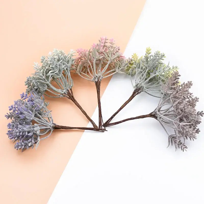 A set of five decorbites artificial water grass sprigs with frosted purple and greenish pink finish for vase decor