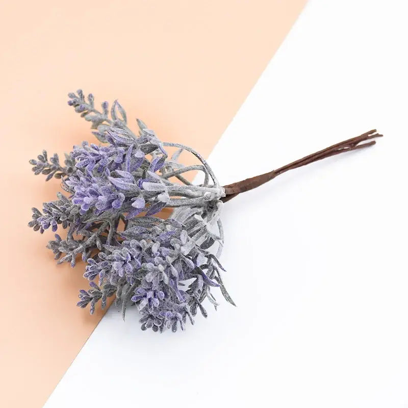 Faux lavender bouquet with purple and gray frosted petals on brown stem in decorbites artificial water grass vase decor