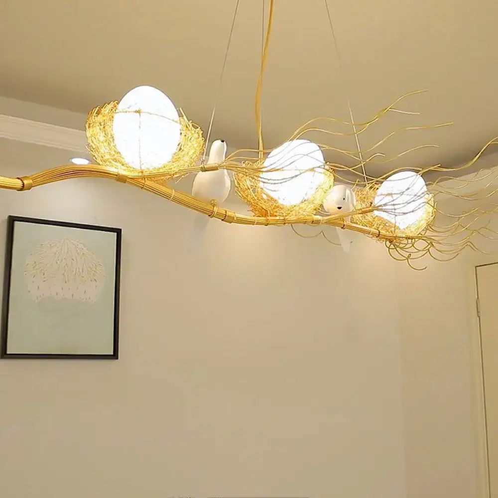 Decorbites™ artistic 3-light beige nest and egg island pendant with cream glass shade featuring golden branch bird design 110v-120v