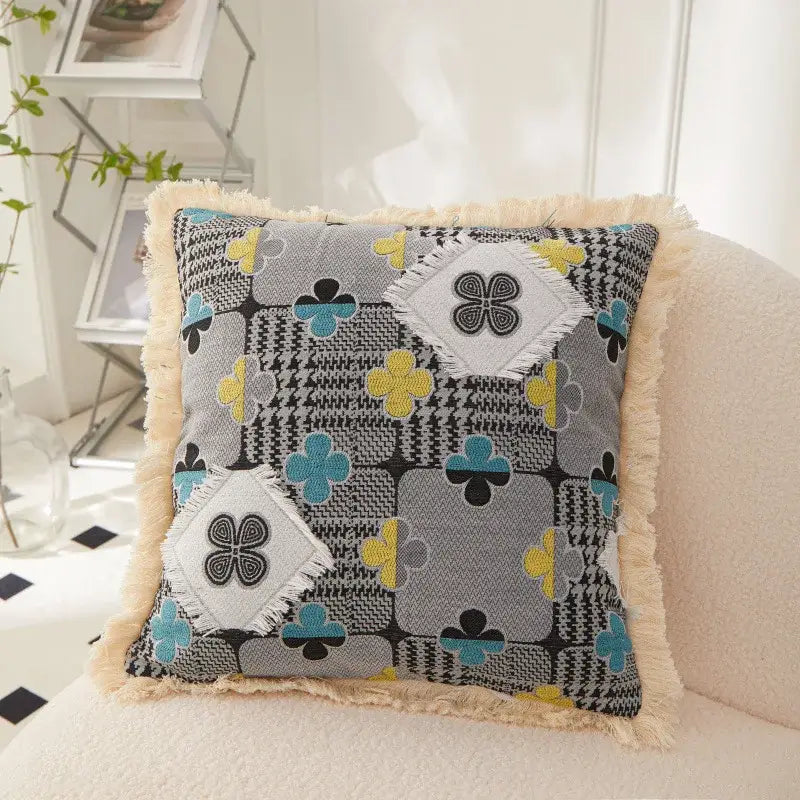 Decorbites artistic 45x45 handmade cushion cover with gray patchwork featuring houndstooth and clover motifs with fringe