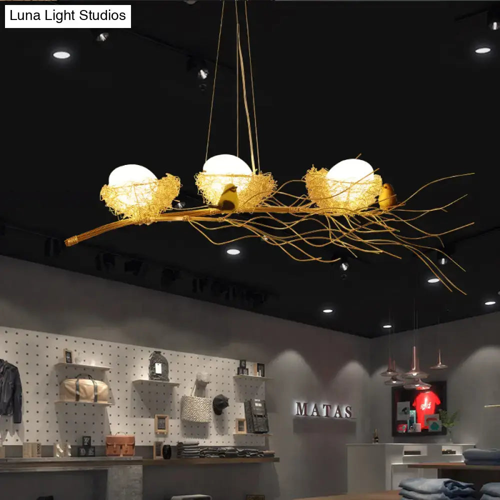 Golden birds nest chandelier with three glowing orbs and intricate aluminum wire branches ceiling light 220v-240v