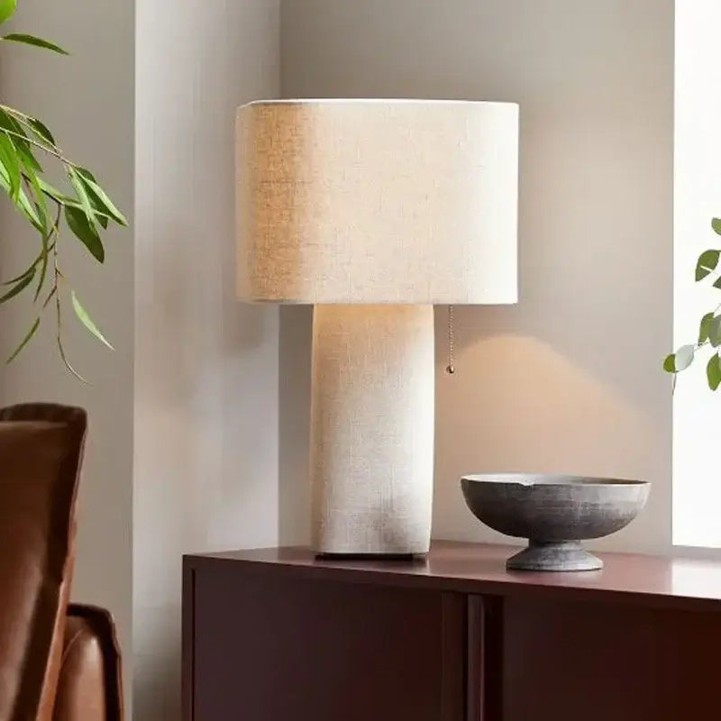 Beige linen-textured decorbites artistic floor lamp with cylindrical base and shade for living room and bedroom use