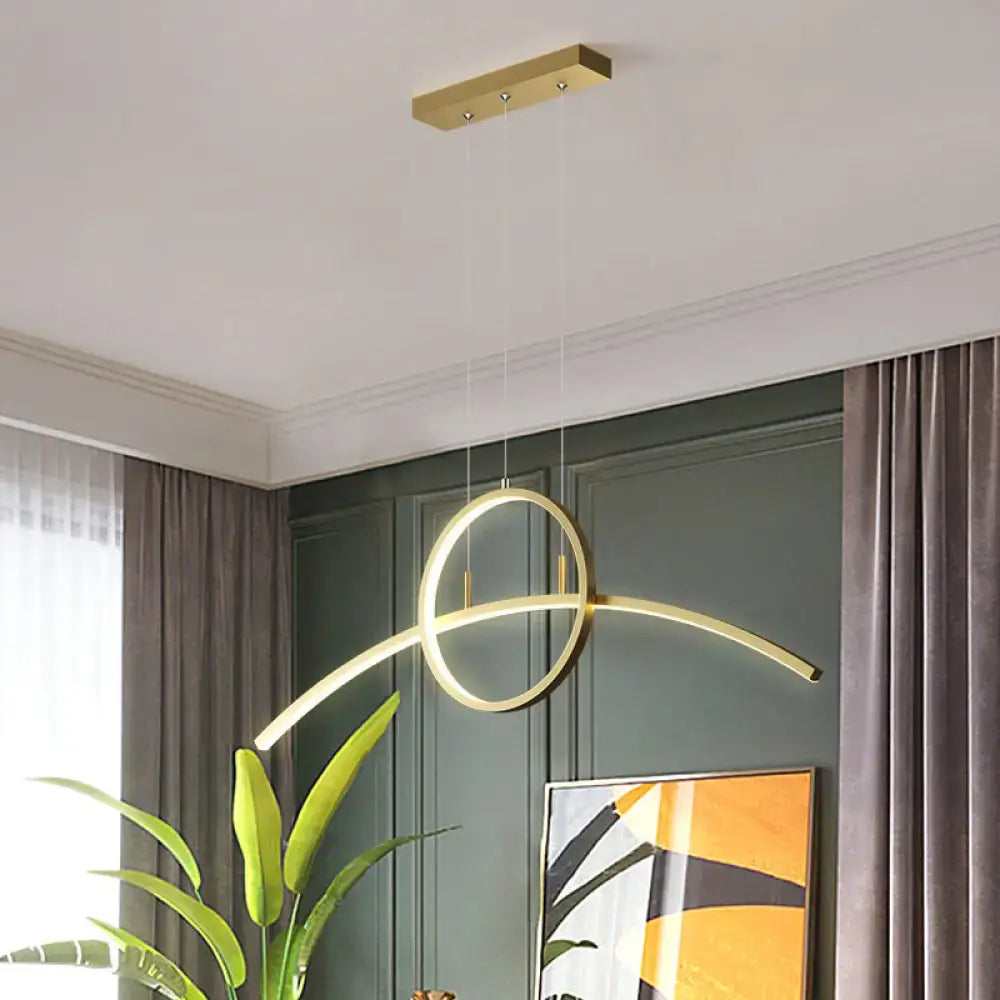 Gold-toned artistic metal LED ceiling light fixture with sleek circular and curved design for dining room use