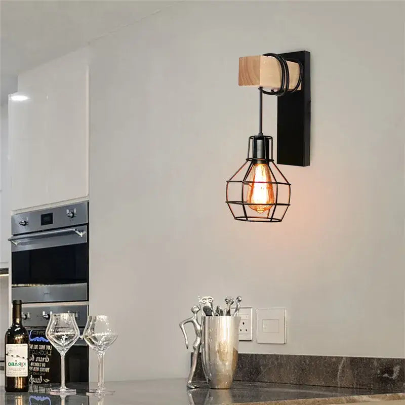 Industrial-style wall lamp by DecorBites artistic metal iron with black frame wooden accent and exposed filament bulb cage