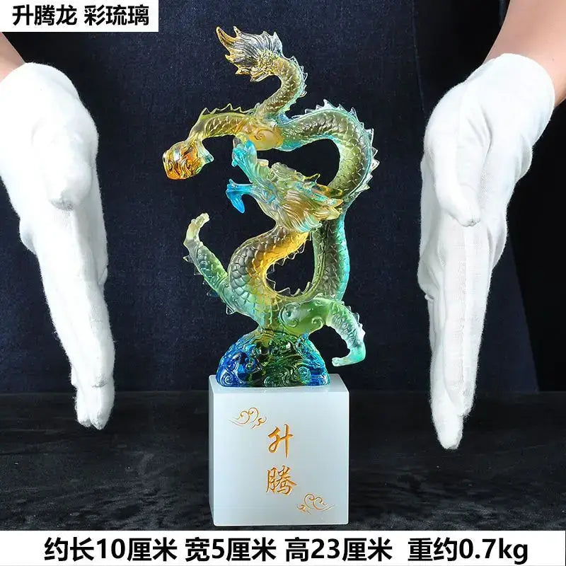 Decorbites ascending dragon feng shui ornament featuring a translucent rainbow glass sculpture on engraved marble base