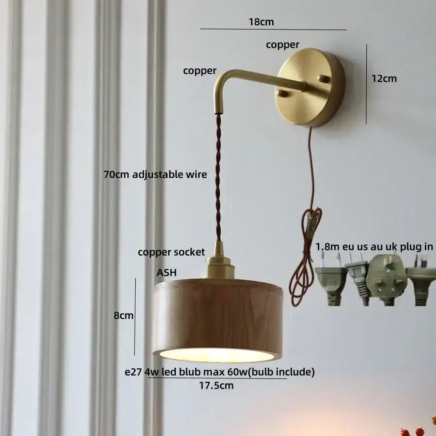 DecorBites ash wood wall lamp with warm copper finish, cylindrical wooden shade, and adjustable braided cord