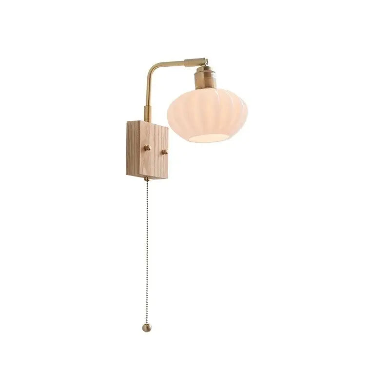 Decorbites ash wood wall light with brass finish, wooden base, and ribbed off-white glass shade, modern nordic design