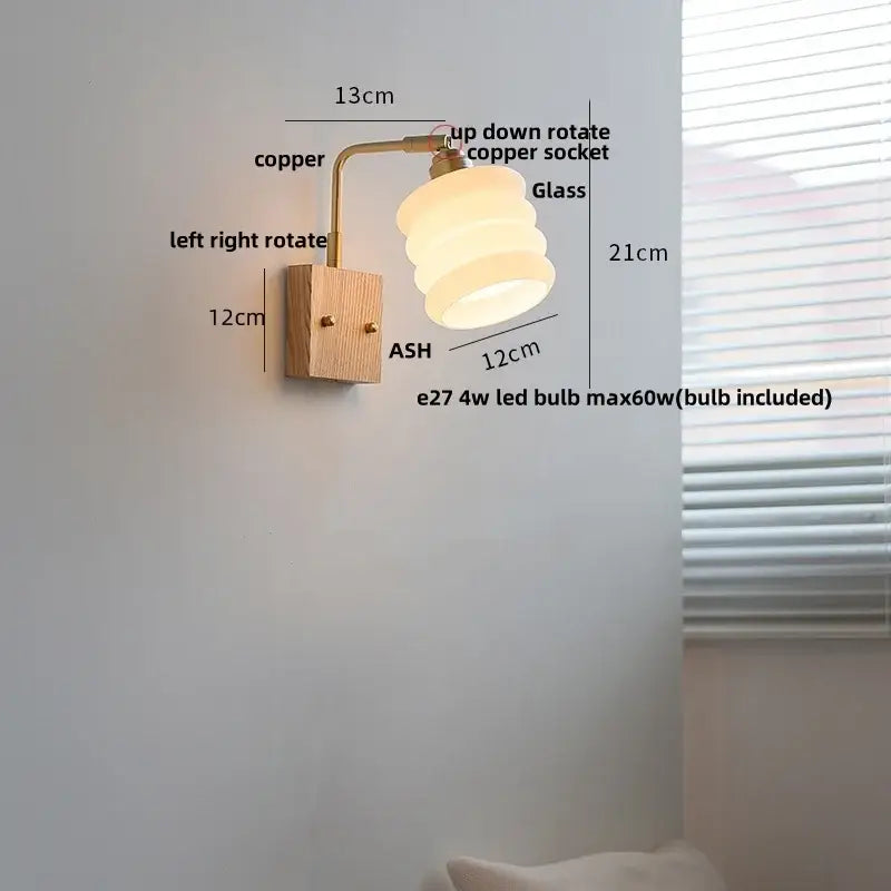 DecorBites ash wood wall light with warm layered glass lampshade, copper arm, wooden base, and adjustable rotation