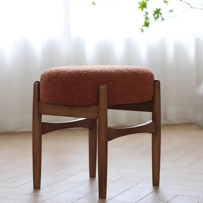 DecorBites ash wood makeup bench with rust-colored textured upholstered seat and sleek wooden legs for small spaces