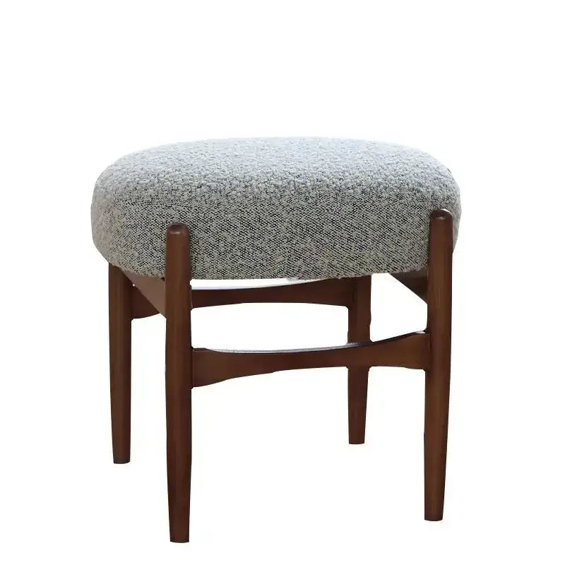 Decorbites ash wood makeup bench with textured gray upholstered seat and slender dark wood legs for small spaces