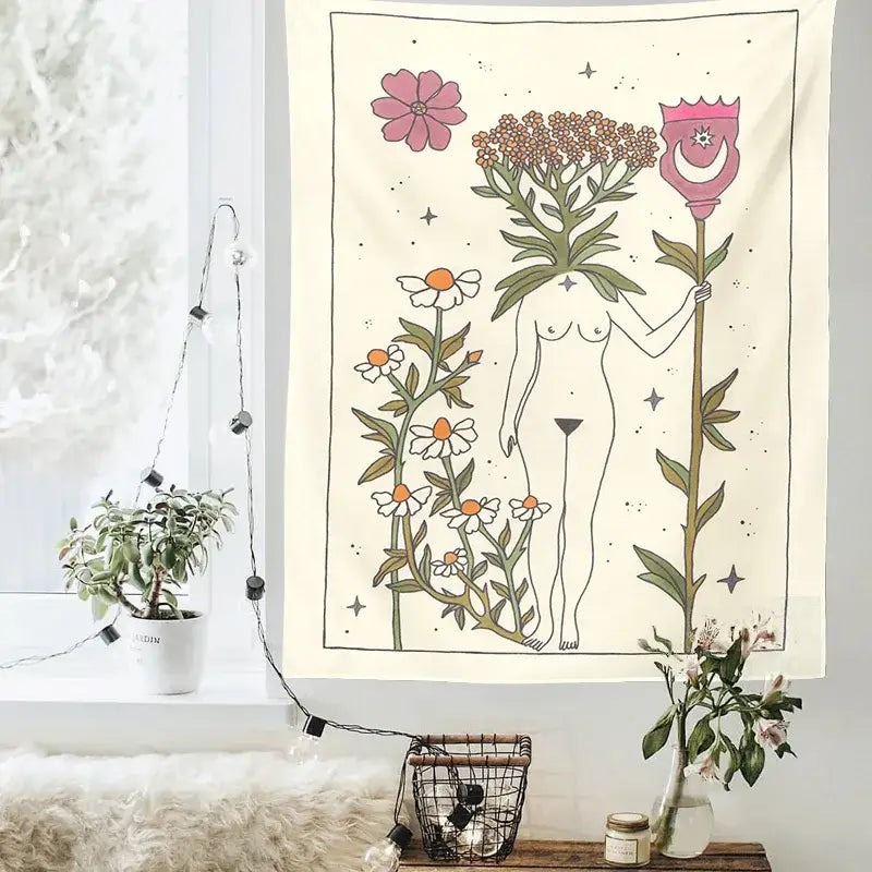 A cream-colored decorbites astrology tarot tapestry featuring a sun moon goddess holding a crowned staff with floral elements