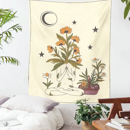 Cream-colored decorbites astrology tarot tapestry featuring a meditating figure with sun moon goddess motifs and floral accents