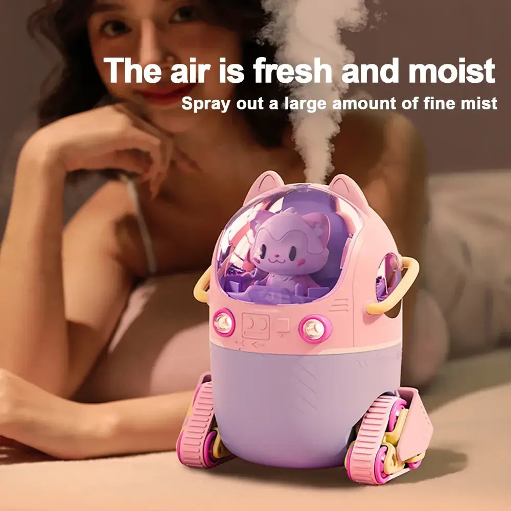 Decorbites astronaut air humidifier in pink and purple cat shape with transparent dome yellow handles and night light