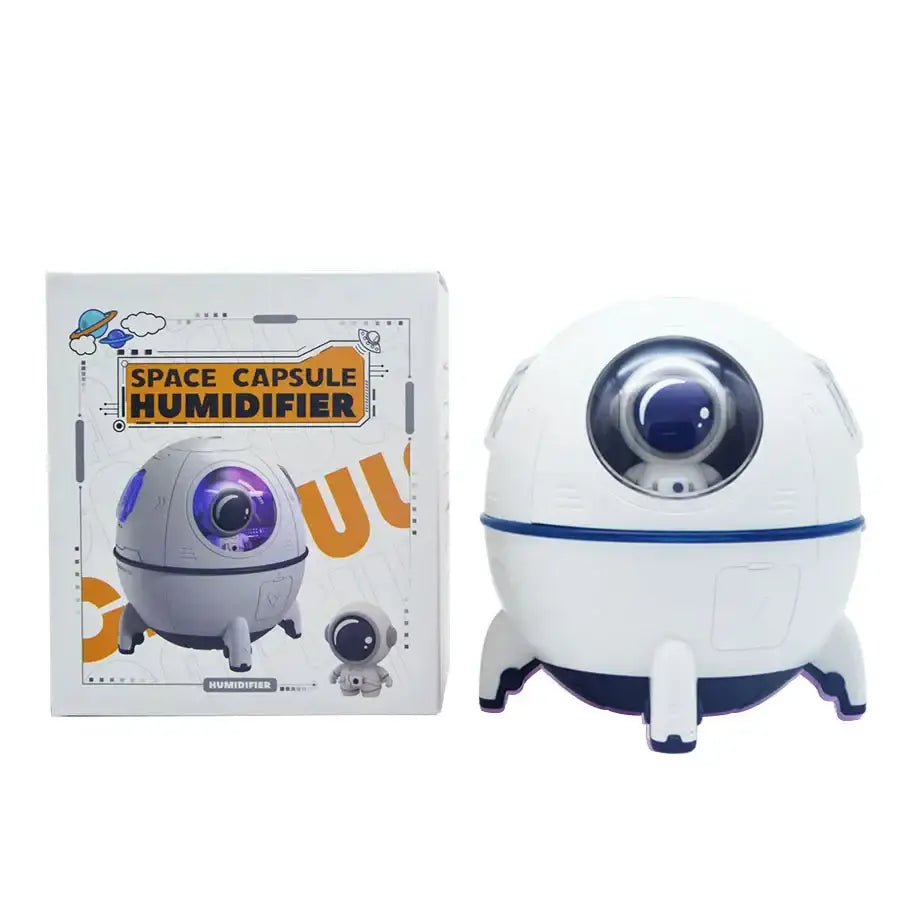 White and navy blue decorbites astronaut air humidifier with night light and glowing purple lens for kids