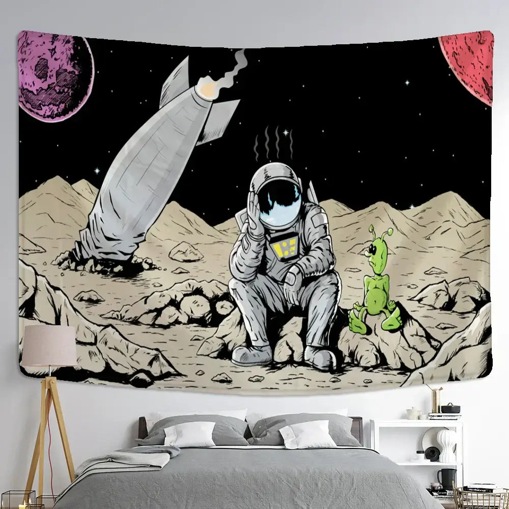 Whimsical decorbites astronaut alien tapestry featuring cartoon astronaut and green alien on rocky lunar surface with planets