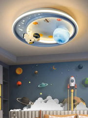 A circular ceiling light decorbites astronaut astros featuring a white astronaut figurine and illuminated blue orange yellow planets