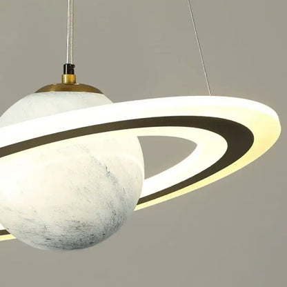 DecorBites astronaut ball led pendant light with textured white marble sphere and glowing illuminated rings for boys room decor