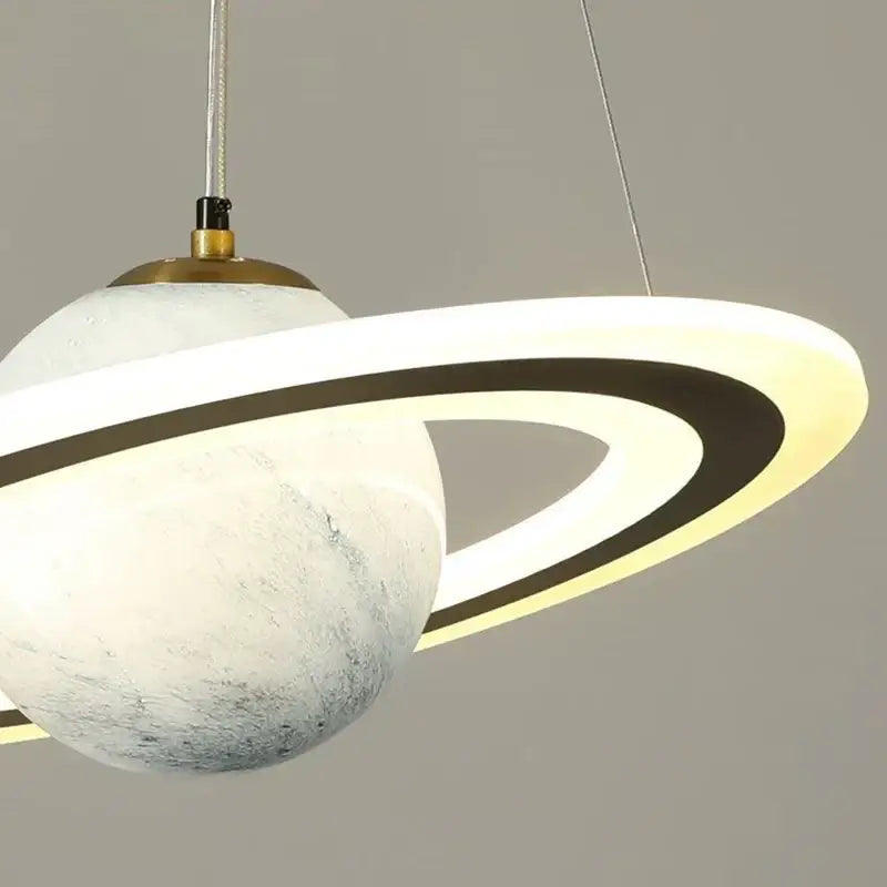 DecorBites astronaut ball led pendant light with textured white marble sphere and glowing illuminated rings for boys room decor