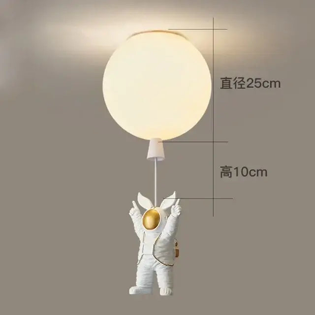 Decorbites astronaut balloon ceiling lamp with white astronaut figure, golden helmet, and glowing spherical balloon light