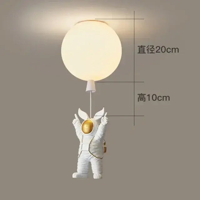 White DecorBites astronaut balloon ceiling lamp holding a glowing spherical LED light for kids room decor