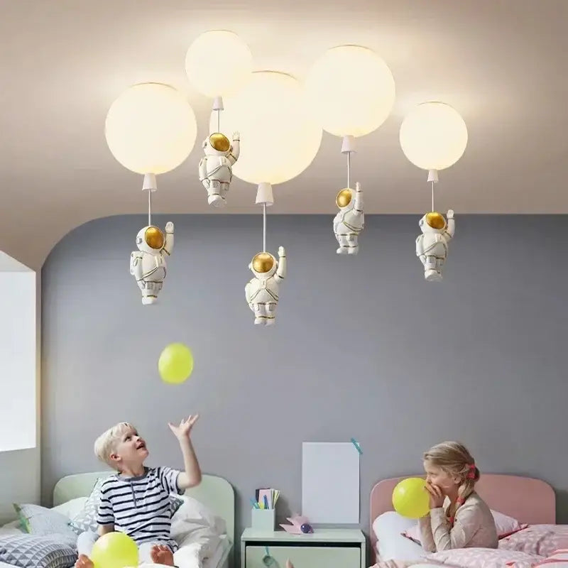 White decorbites astronaut balloon ceiling lamp with gold accents and spherical LED bulbs for kids room lighting
